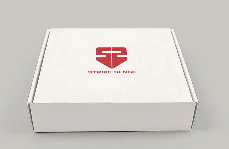 Strike Sense brandmark printed on a white shipping box